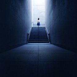 Woman walking in corridor