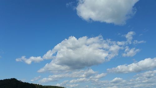 Low angle view of clouds in blue sky