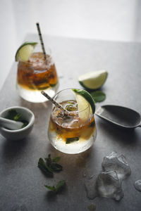 High angle view of golden mojito on kitchen counter