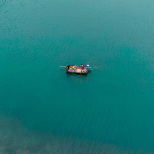 High angle view of boat sailing in sea