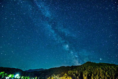 Low angle view of star field against sky at night