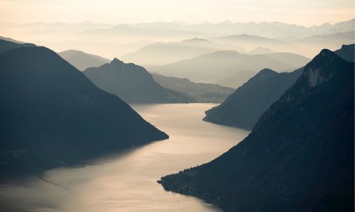 Scenic view of mountains against sky during sunset