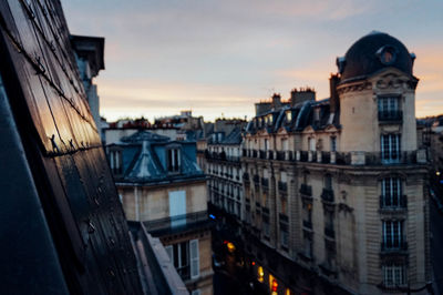 Buildings in city against sky