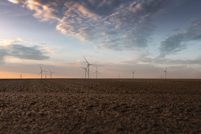 Landscape against sky at sunset