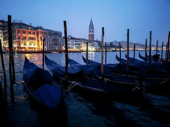 Boats moored in canal