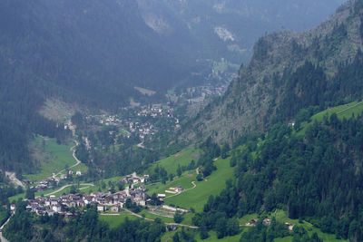 High angle view of townscape against mountains