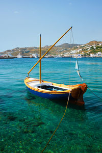 Boat in sea against clear sky