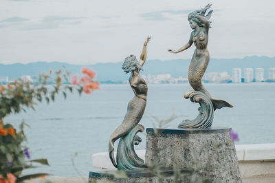 Close-up of statue against sky