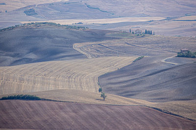 High angle view of road amidst agricultural field