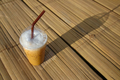 High angle view of iced coffee on table