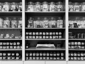 Full frame shot of bottles in store