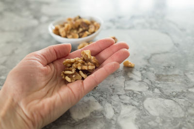 Close-up of hand holding food