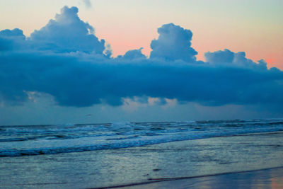 Scenic view of sea at sunset