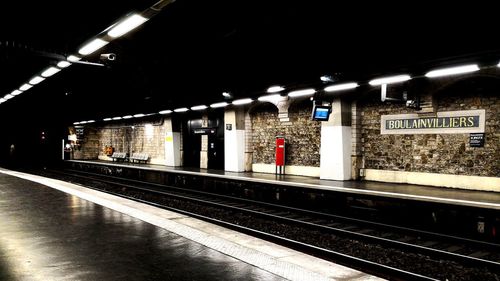 Train at railroad station at night