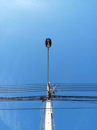 Low angle view of street light against clear sky