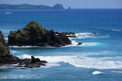 Scenic view of sea against clear sky