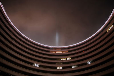 Low angle view of illuminated building at night