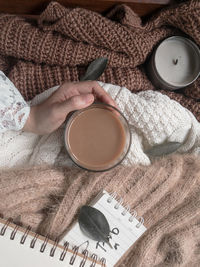 High angle view of coffee cup on table