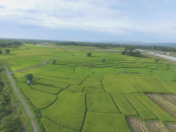 High angle view of agricultural field against sky