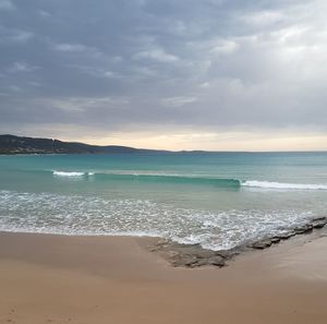 Scenic view of beach against sky