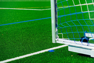 Cropped goal post on soccer field