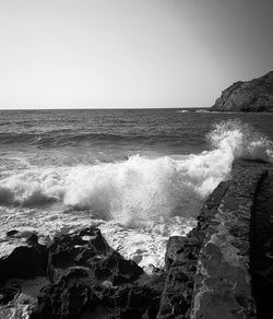 Scenic view of sea against clear sky