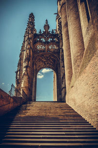 Low angle view of old building against sky