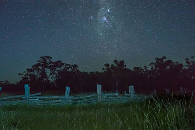 Scenic view of landscape against sky at night