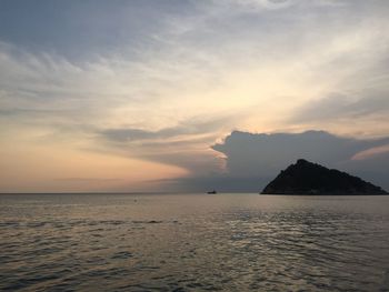 Scenic view of sea against sky at sunset