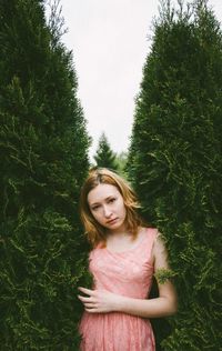 Portrait of young woman in park