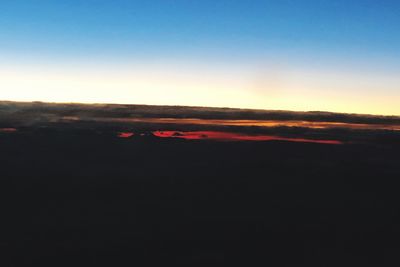 Scenic view of silhouette landscape against sky during sunset