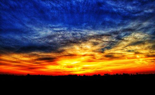 Scenic view of dramatic sky during sunset