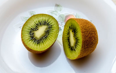 Close-up of fruits in plate on table
