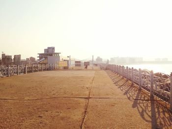Panoramic view of beach against clear sky
