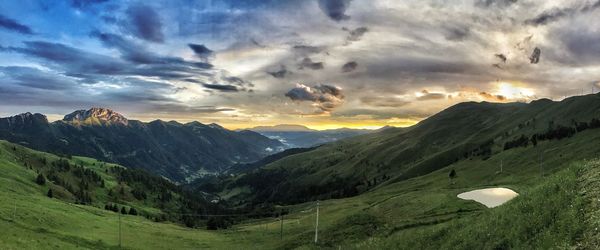 Scenic view of mountains against sky during sunset