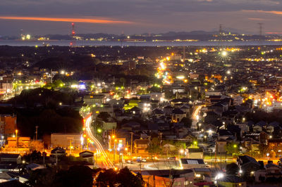 High angle view of illuminated city at night