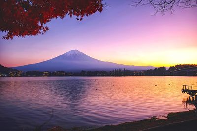 Scenic view of lake against sky during sunset