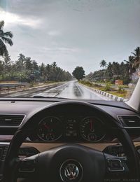 Road seen through car windshield