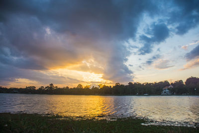 Scenic view of lake against sky during sunset