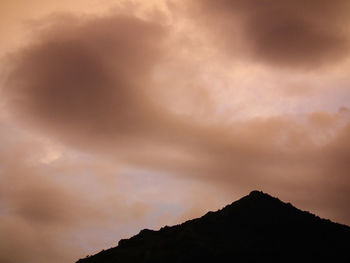 Scenic view of mountains against sky at night