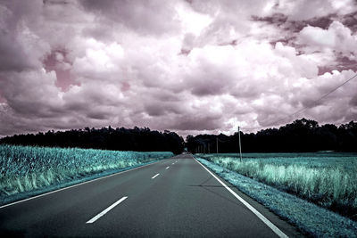 View of road against cloudy sky