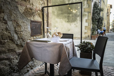 Empty chairs and tables in restaurant