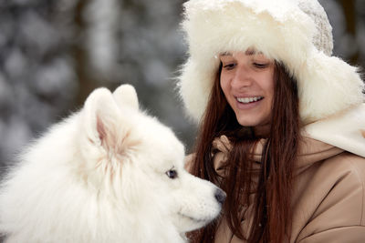 Portrait of woman with dog