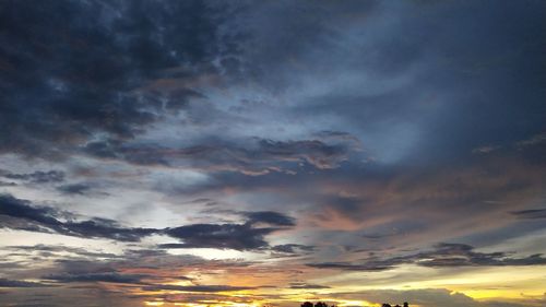 Low angle view of dramatic sky during sunset