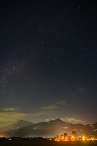 Scenic view of star field against sky at night