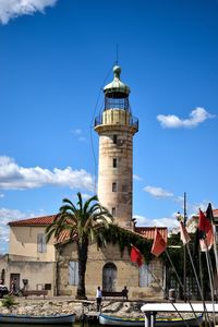 Low angle view of built structure against blue sky