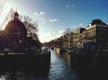 View of canal along buildings