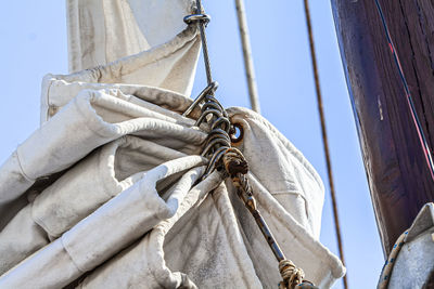 Close up of old furled sail of a yacht. selective focus