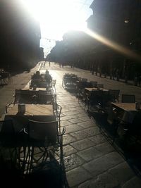 Empty footpath at sunset