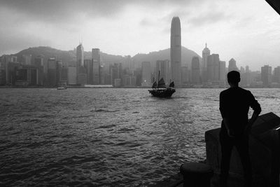 Silhouette of man looking at view